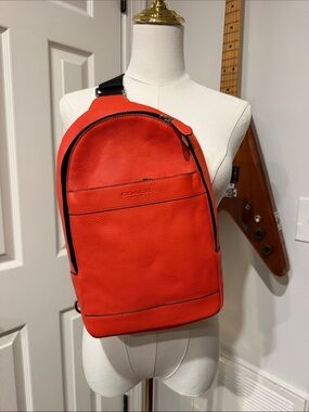 NWT Coach Orange Pebble Leather Crossbody Sling with Black Strap